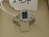 an image of a diamond ring in a box with a price tag