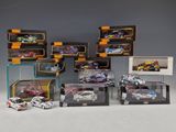 a lot of toy cars that are in a display case
