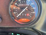 a close up of a speedometer on a motorcycle
