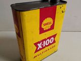 shell x - 100 multigrade oil can with red cap