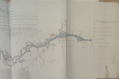 a map of a river in a book on a table