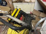 a pile of electrical equipment in a room that needs to be demolished