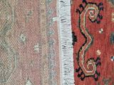 an image of a close up of a rug with a red background