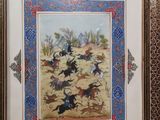 framed picture of a painting of a group of horses running in the desert