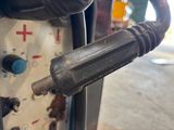 a close up view of a gas pump with a hose attached to it