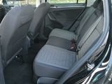 a car that has two seats in the back of it