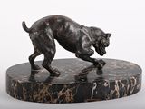 statue of a dog running on a marble base on a white background