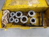 a yellow box with a bunch of tools inside of it