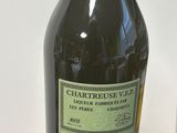 a bottle of wine that is sitting on a table