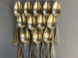 a lot of spoons and a spatula on the table