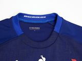 the back of a blue and red soccer jersey with a rooster on it
