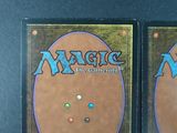 two decks of magic the gathering are shown on a table