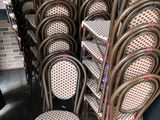 a lot of chairs that are lined up on the floor