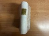 a book that is sitting on a wooden table