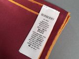 the label on a burberry jacket is attached to the back of the jacket
