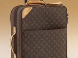 une image représentant une valise Louis Vuitton sur fond blanc