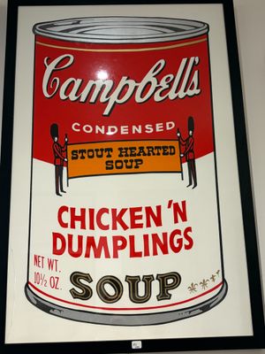 Panneau « Soupe au poulet et aux boulettes de Campbell » encadré dans un cadre noir