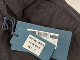 a close up of a pair of pants with a tag on it