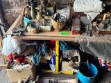 a workbench that has many tools on it