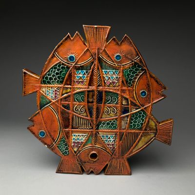 an image of a ceramic sculpture of a fish