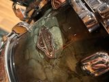 an image of a close up of a drum in a recording studio