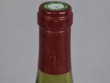 a bottle of wine that is sitting on a table