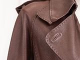 brown leather trench coat on a mannequin mannequin mannequin mannequin mannequin mannequin mannequin mannequin manne