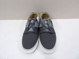 vans slip - ons with camouflage print on the soles