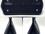 two photos of a blue purse with a metal handle