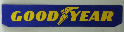 a good year sign hanging on the wall of a building