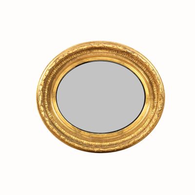 une image d'un miroir encadré d'or sur un mur blanc