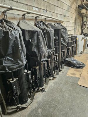 a man that is standing in front of a bunch of machines