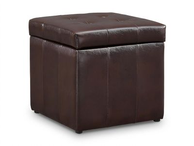 un pouf en cuir marron avec un dessus capitonné sur fond blanc