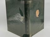 an old book with a picture of a woman on it
