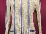 a woman ' s jacket on a mannequin mannequin mannequin mannequin mannequin mannequin mannequin mannequin mann