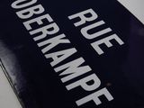 a blue sign that says police department on it