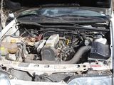 a car that has its hood open with the hood up