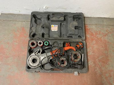a tool kit that is sitting on the floor
