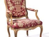 an image of a red and gold chair on a white background