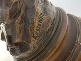 a statue of a horse that is standing on a pedestal