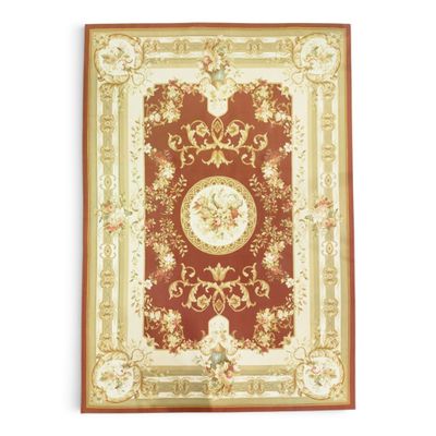 un gros plan d'un tapis rouge et doré sur fond blanc