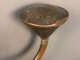 a close up of a metal object on a table
