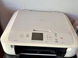 a printer that is sitting on top of a table
