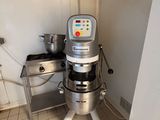 a machine that is sitting in the corner of a room