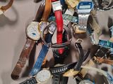 many different types of watches on the table together