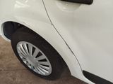 a close up of a white car with a black door handle