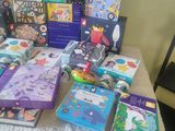 many children ' s books that are on a table