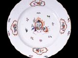 a plate with a picture of a squirrel on it