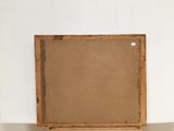 an old wooden easel with a piece of paper on top of it