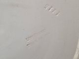 a white plate that has writing on it